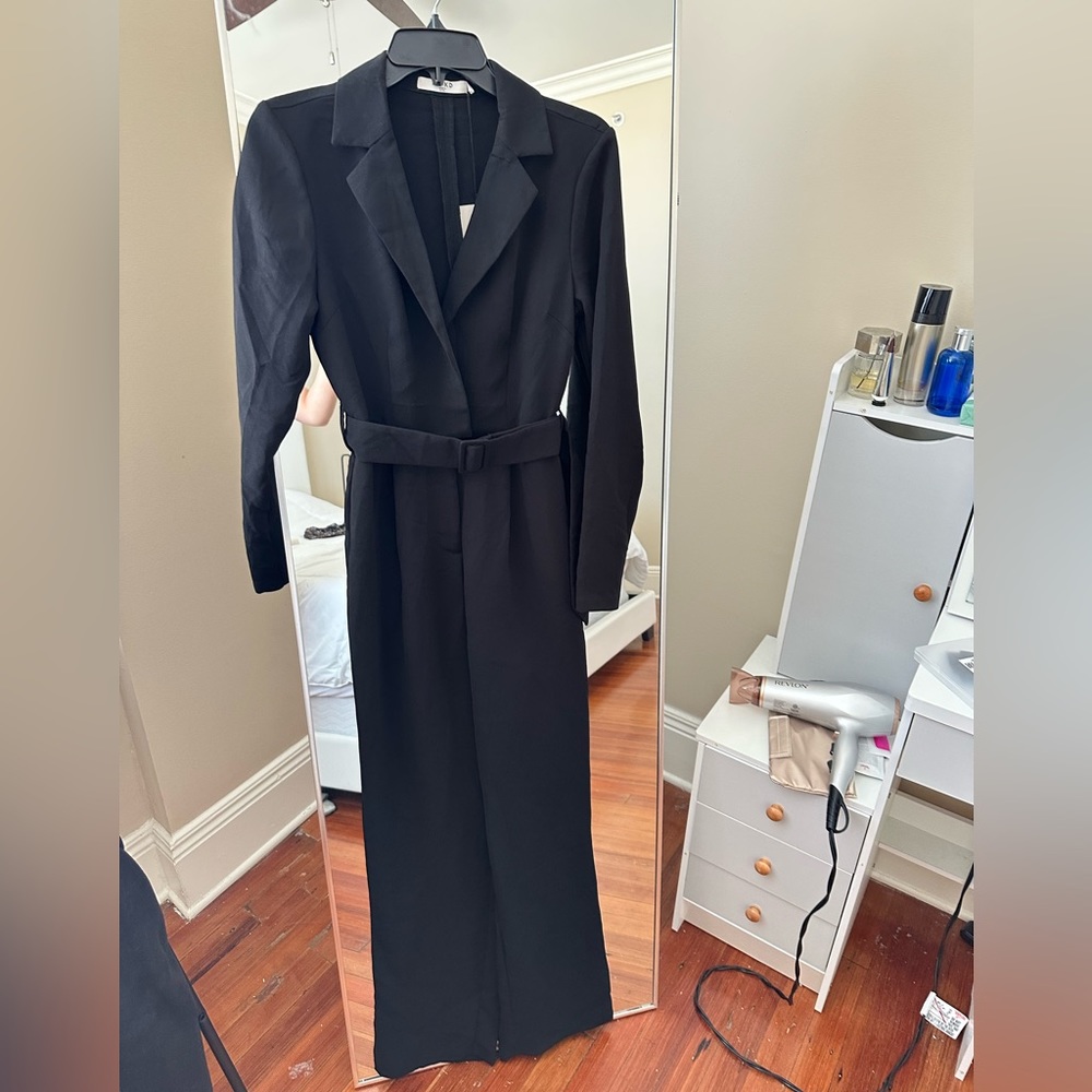 Classy and timeless black bodysuit. Worn once.